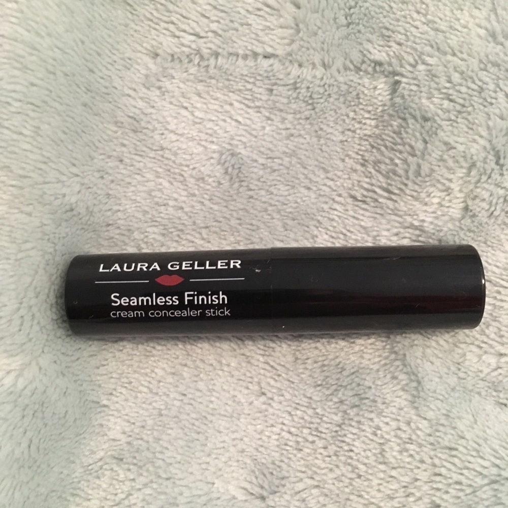 Laura Geller cream concealer stick.